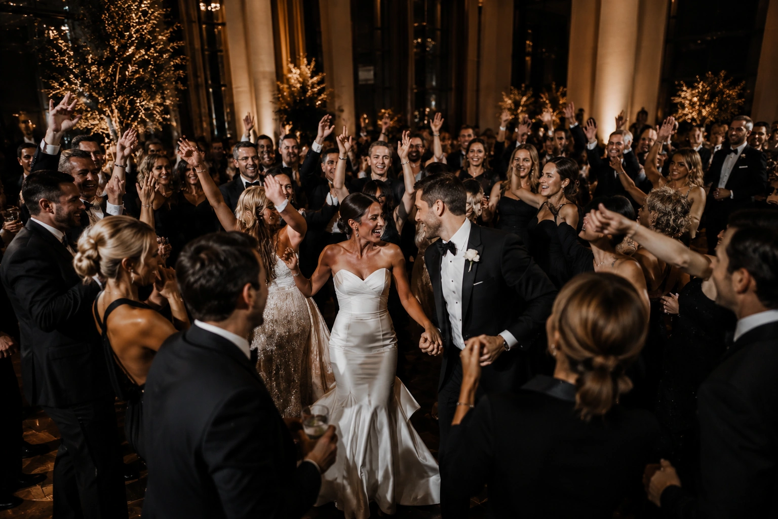 Wedding guests celebrating on the dance floor