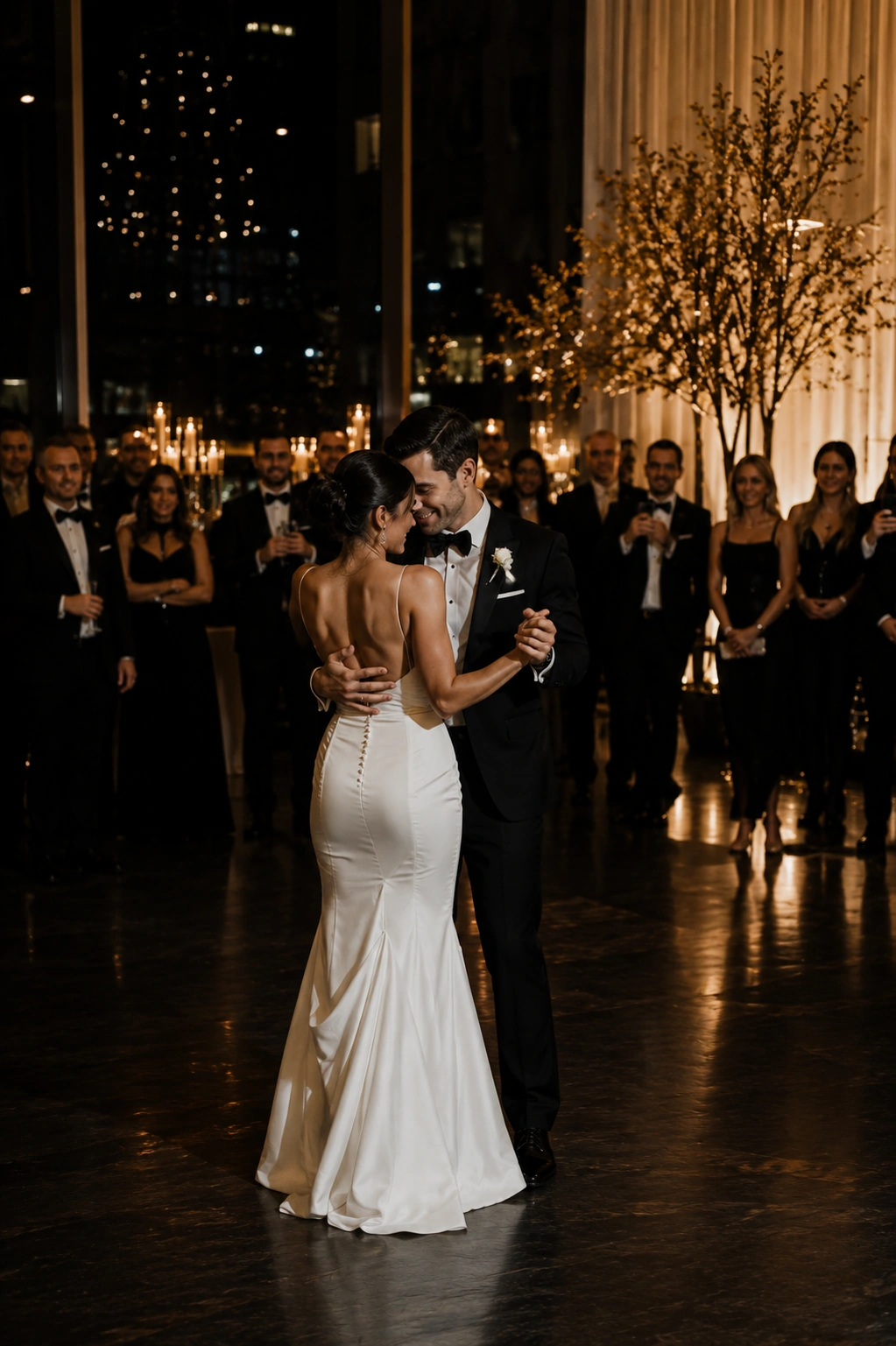 Newlyweds and guests celebrating at a luxury wedding reception