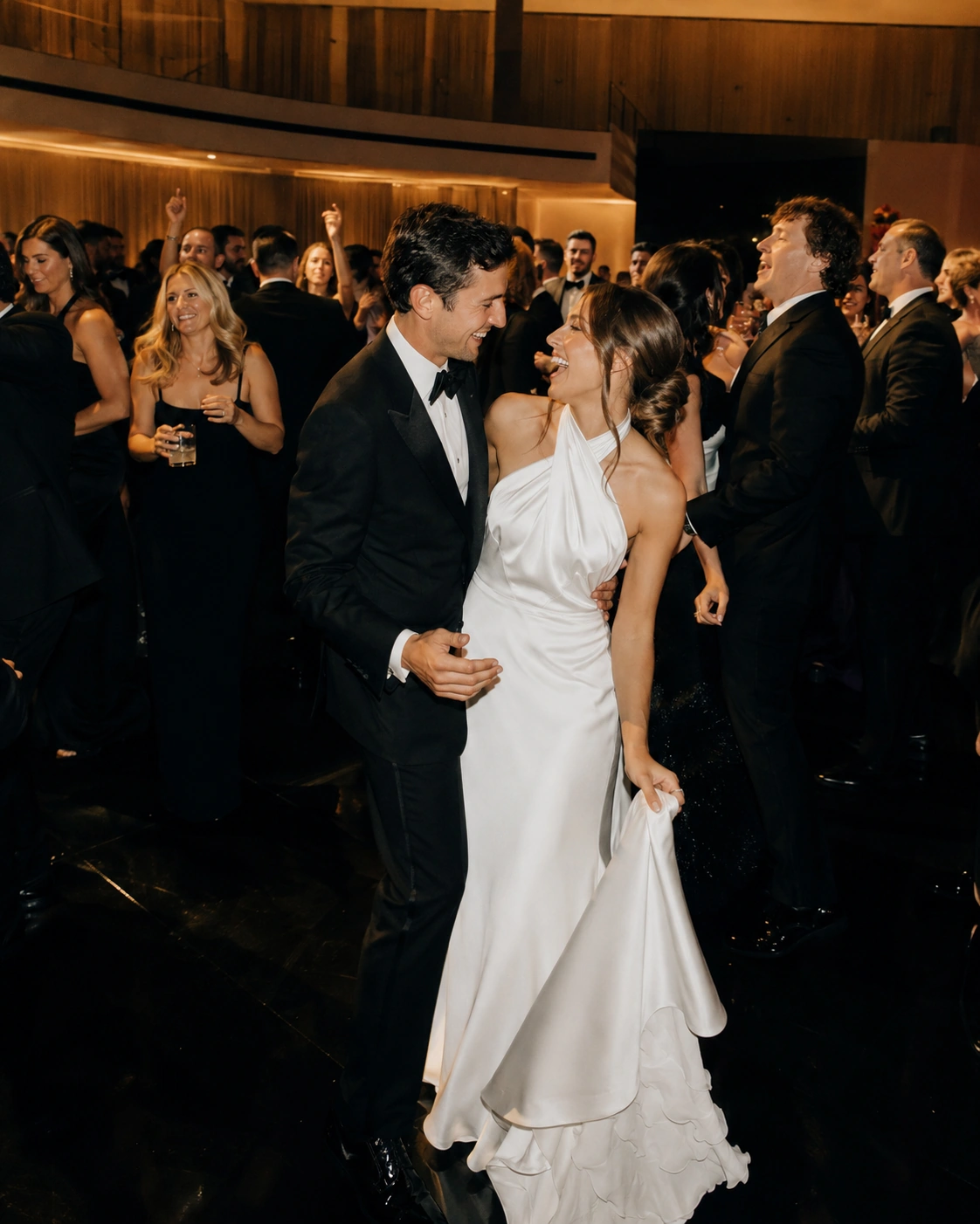 Professional wedding DJ performing in an upscale modern reception